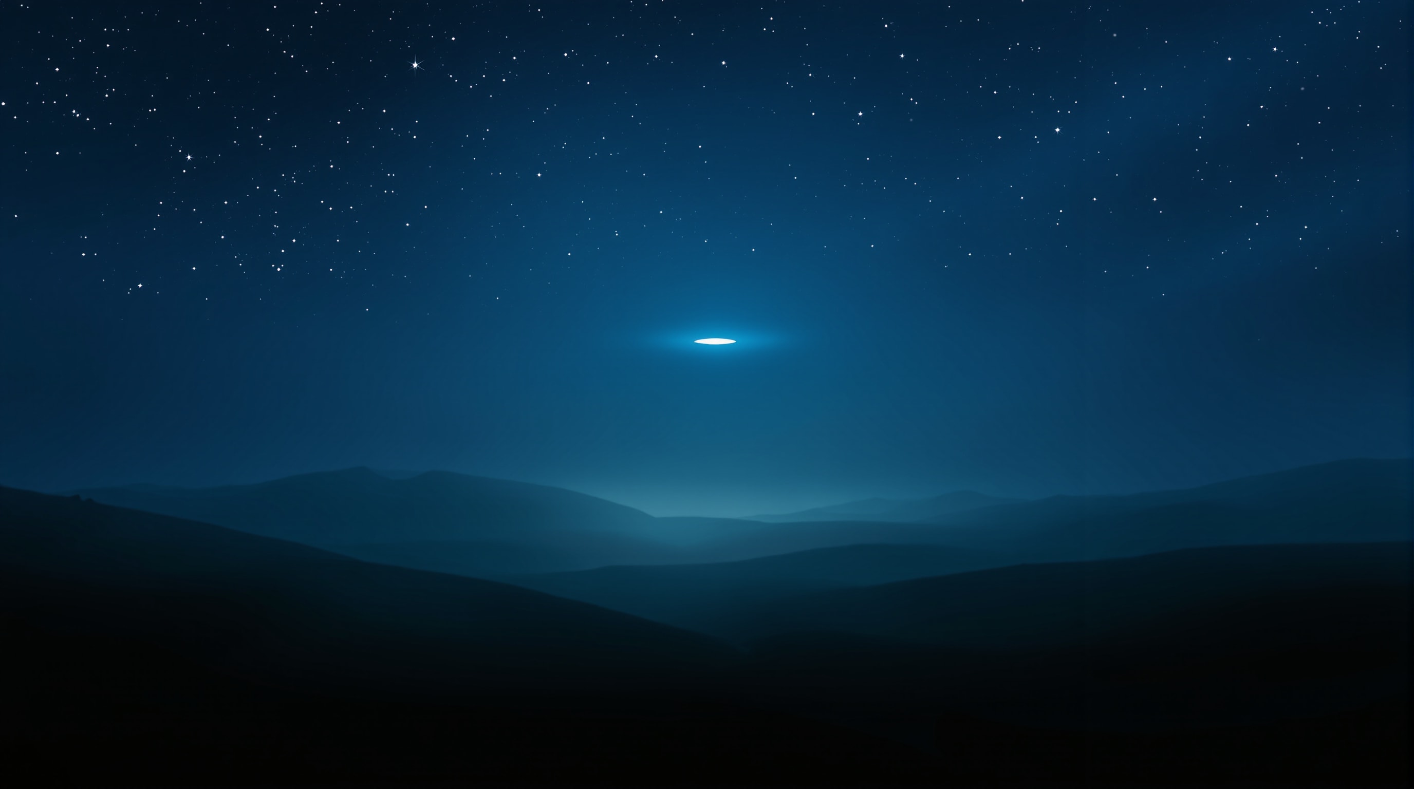 A faint distant disc-shaped light hovering in a misty night sky over dark countryside